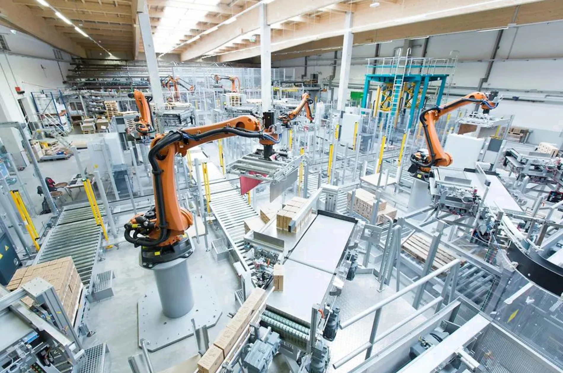 Automated manufacturing facility with industrial robotic systems