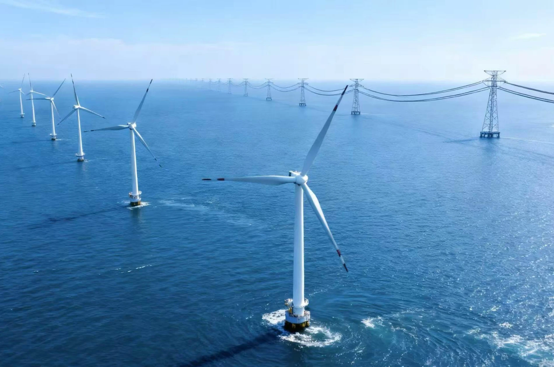 Offshore wind energy and marine electrical power transmission